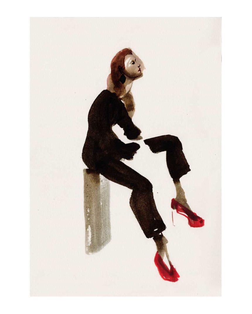 Ink illustration of sitting woman wearing black Isabel Marant outfit and red shoes.