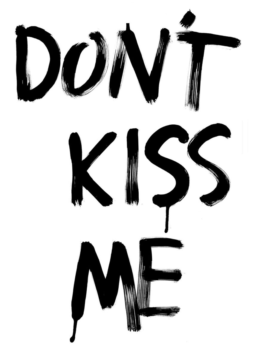 Text with brush strokes in black Don't kiss me