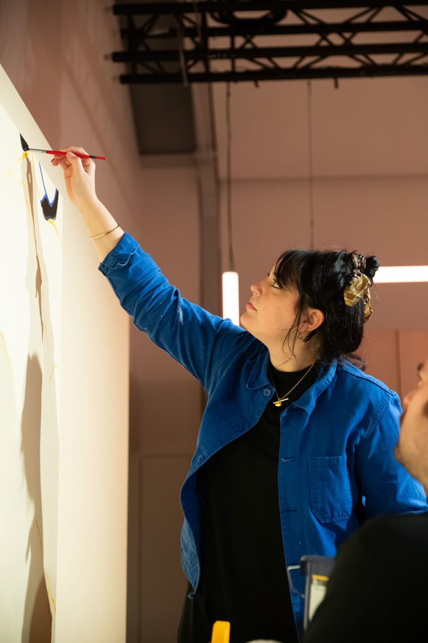 Photo of Rosie McGuinness painting.